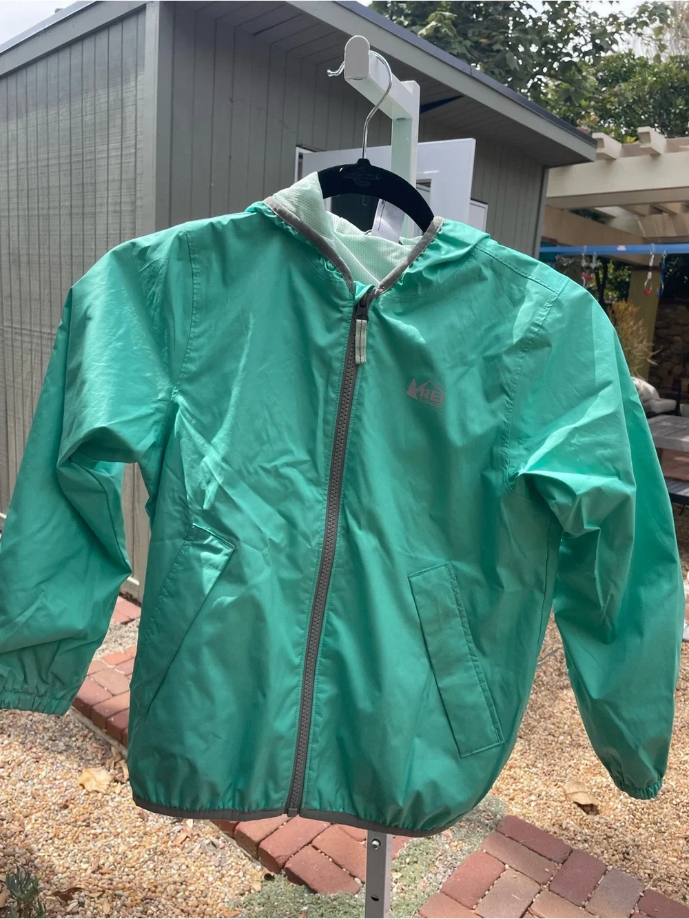 REI Kids' Hooded rain Jacket in Teal Green